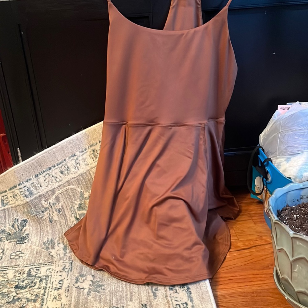 Brown athletic dress with shorts under the skirt. by revival. size L
